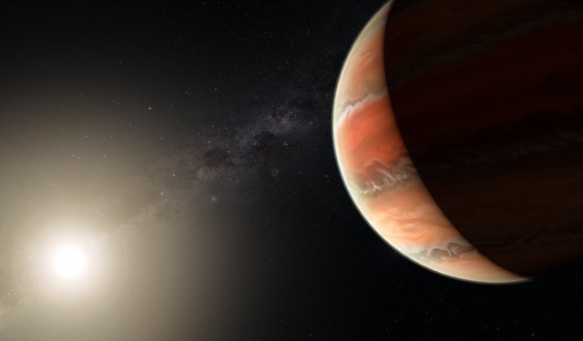中心星とWASP-19 bの想像図 中心星とWASP-19 bの想像図